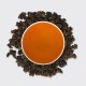 Amber Gaba Oolong, tea leaves and steeped liquor
